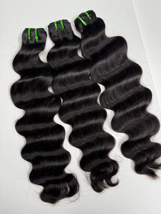 Flowywig Raw Burmese Wavy Bundles Laid Out – Lightweight Look with Subtle Body